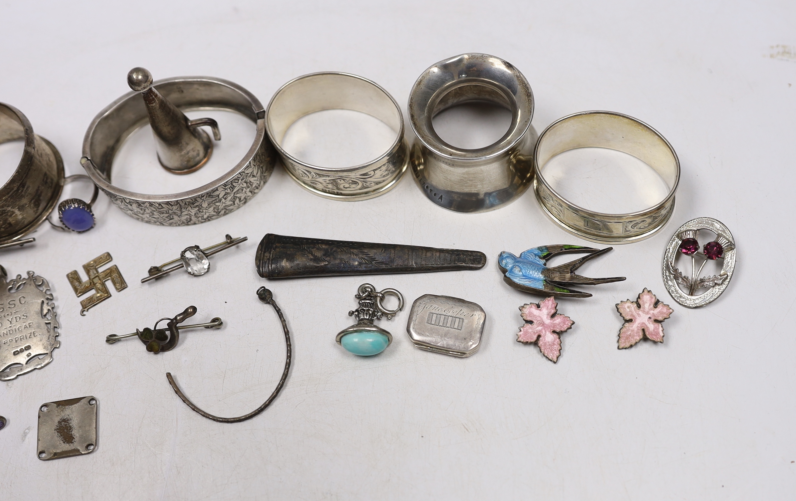 Small silver and other items including napkin rings, bracelets, 19th century vinaigrette, medals, etc.